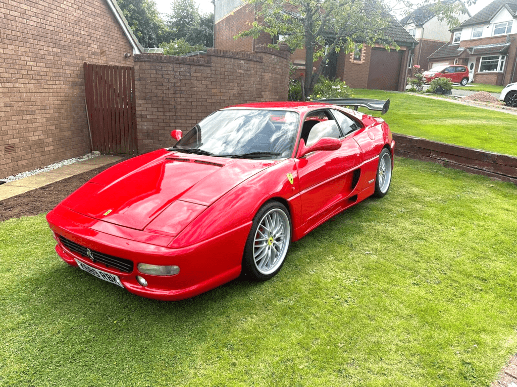 Red Ferrari F355-style replica based on a Toyota MR2, front view