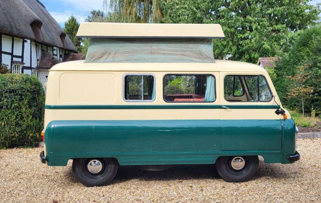 Side view of a Morris J2 camper with elevating roof