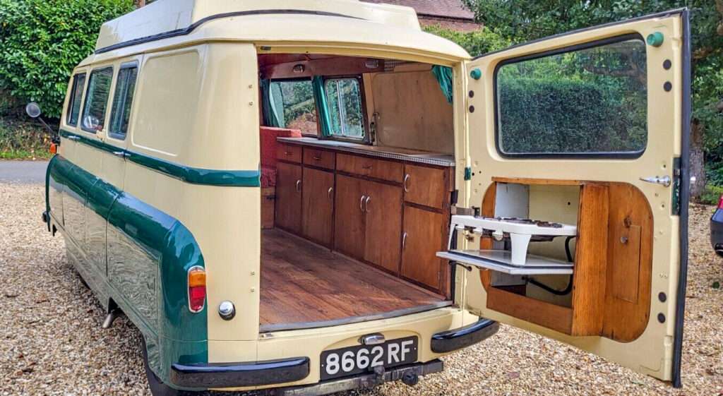 Period-style interior inside a Morris J2 camper