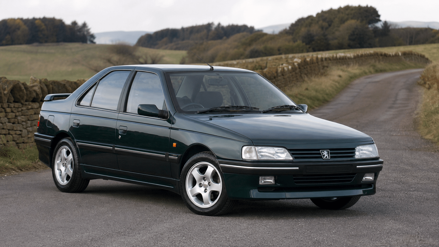 Dark green Peugeot 405 T16 representing the Rare and Performance Peugeot hub