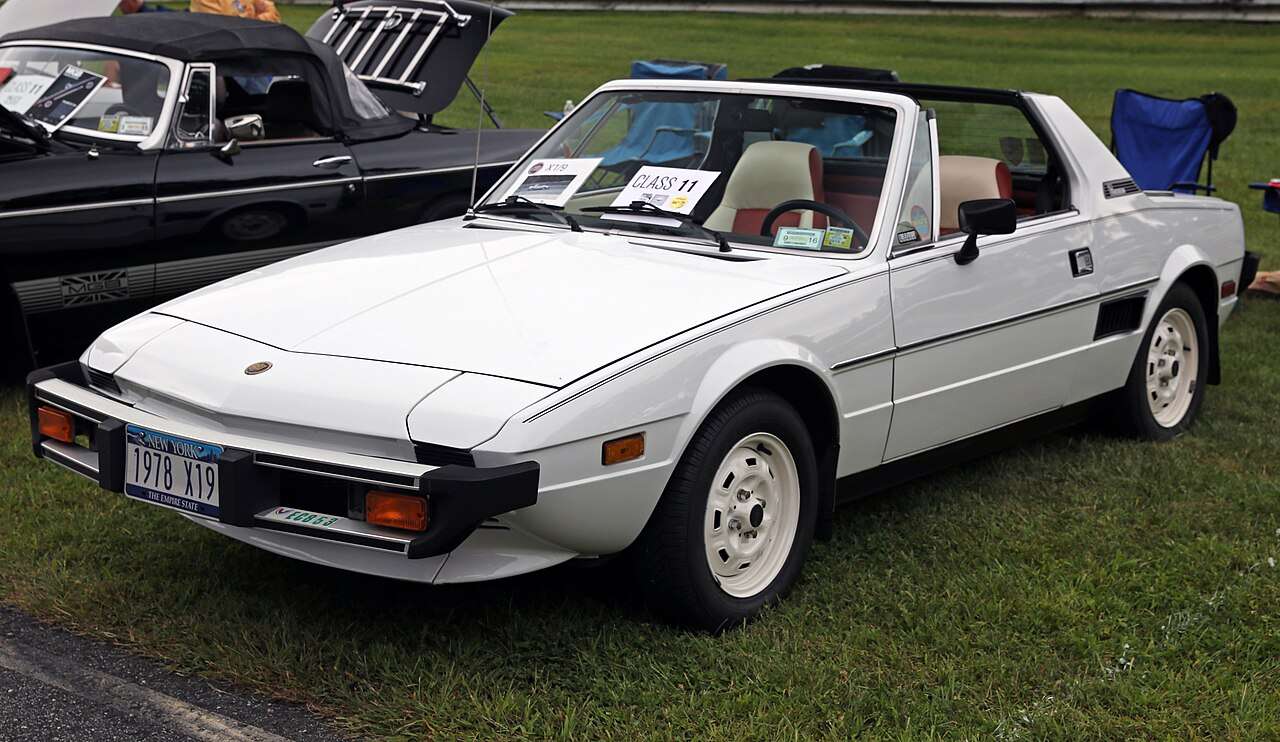 White 1978 Fiat X1/9 viewed from the front left