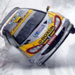 Peugeot 206 WRC competing in the 2003 Swedish Rally