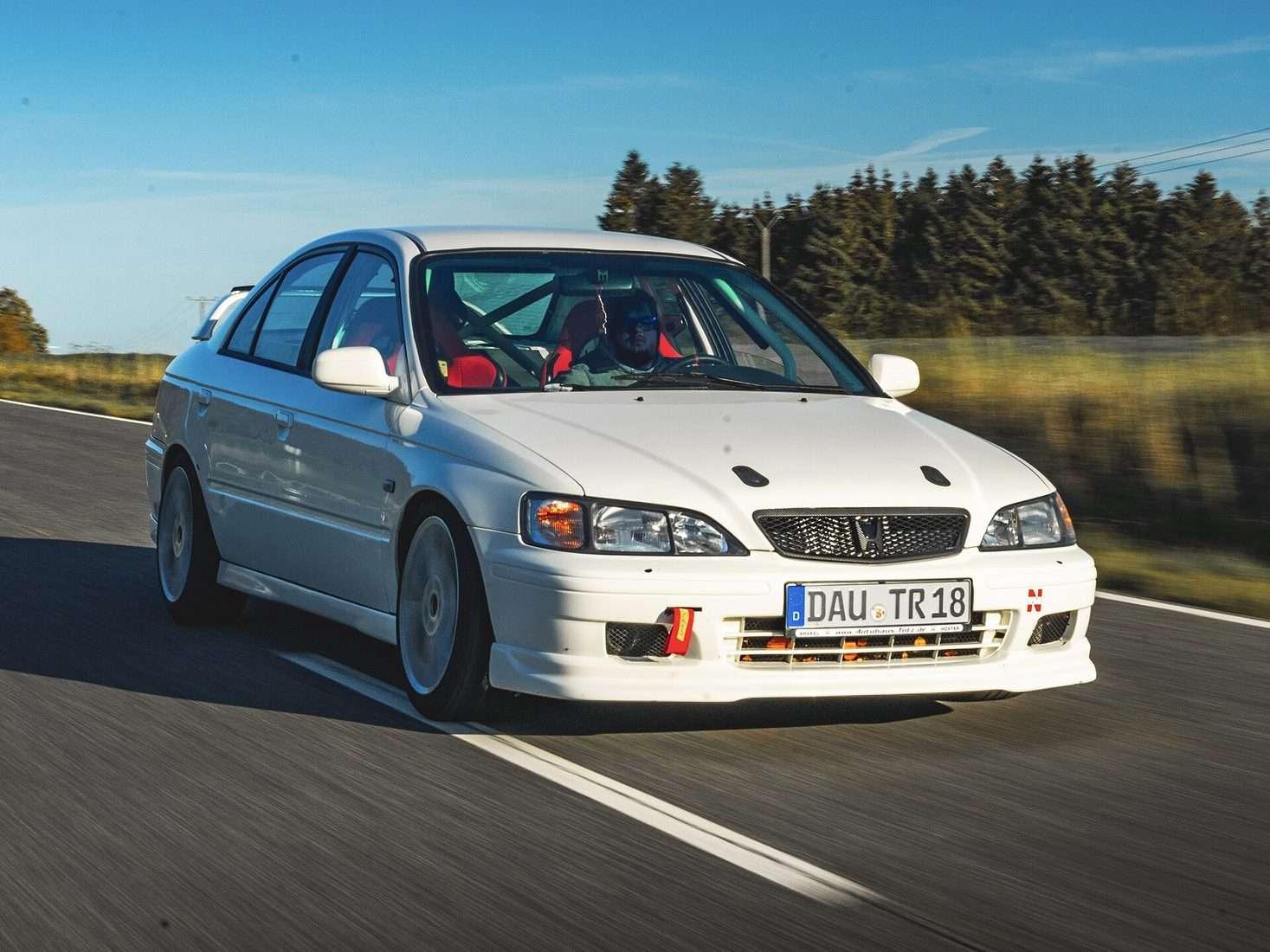 White Honda Accord Type R CH1 driving on the road