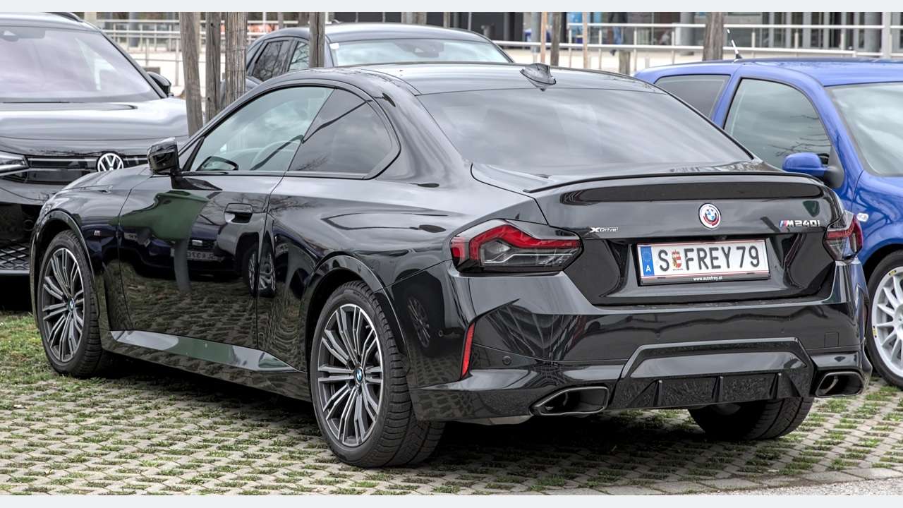 BMW M240i G42 original fixed-roof Coupé, rear three-quarter view