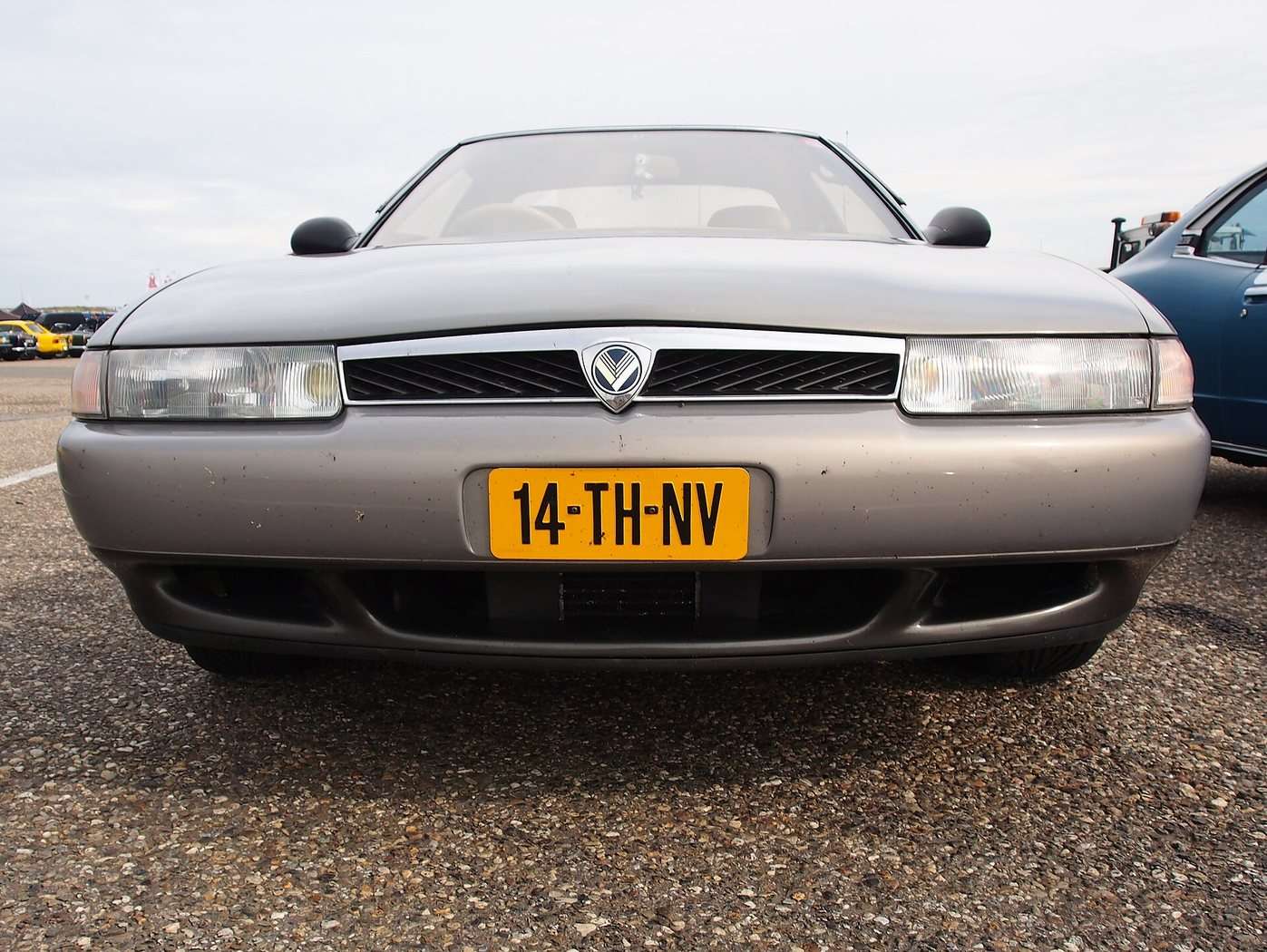 1990 Eunos Cosmo rear three-quarter view