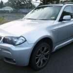 Facelift E83 xDrive30d five-door SUV, front three-quarter view