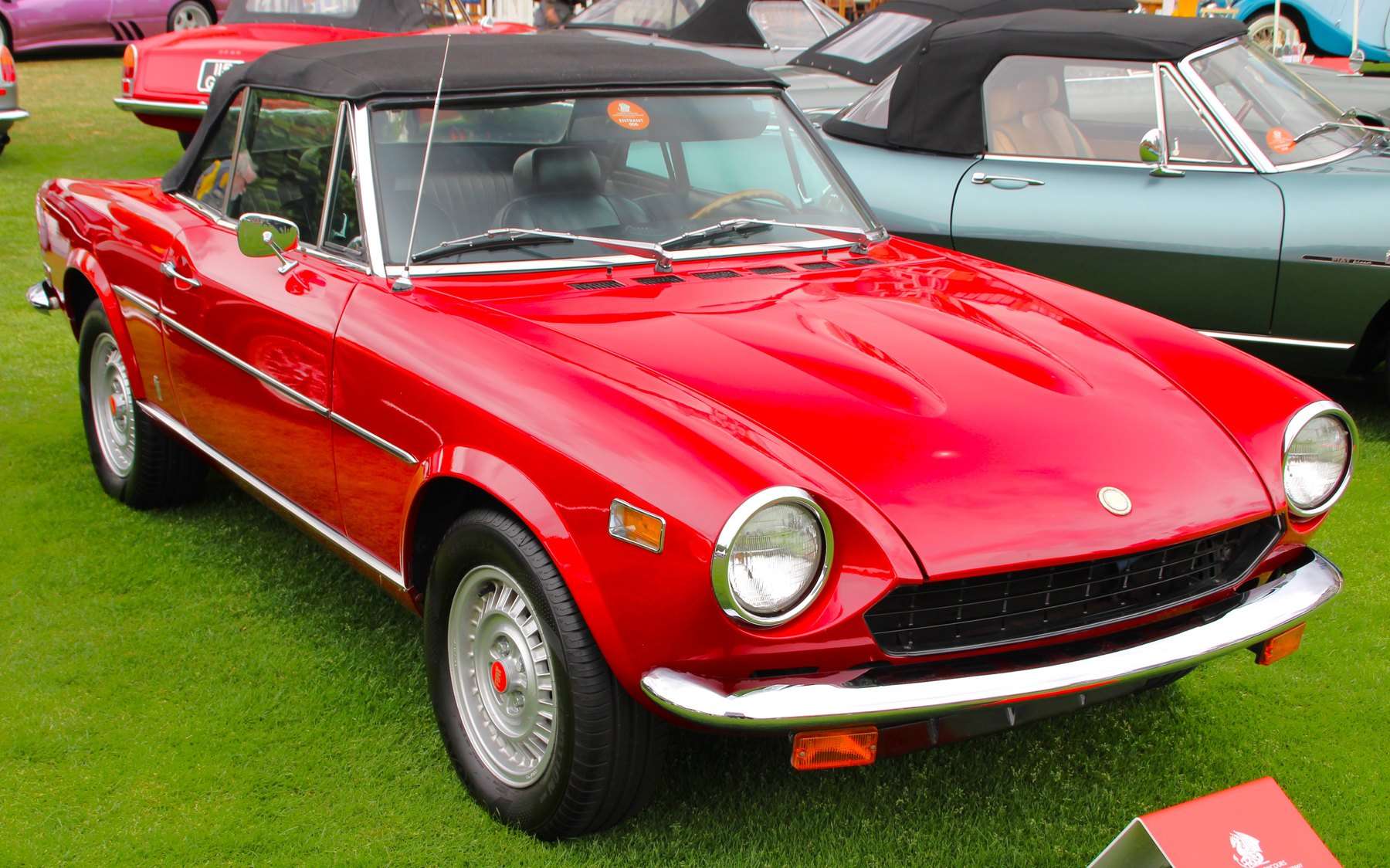 Red 1976 Fiat 124 Sport Spider at the London Concours