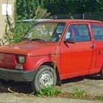 Red Fiat 126 viewed from the front