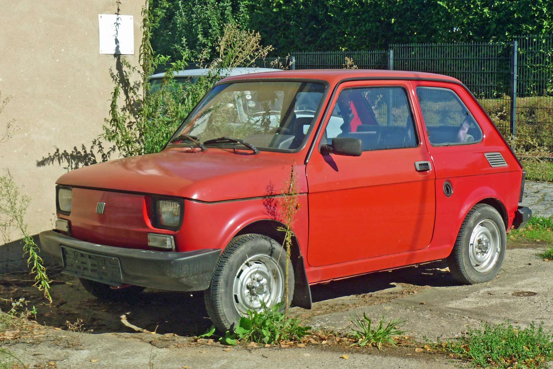 Red Fiat 126 viewed from the front