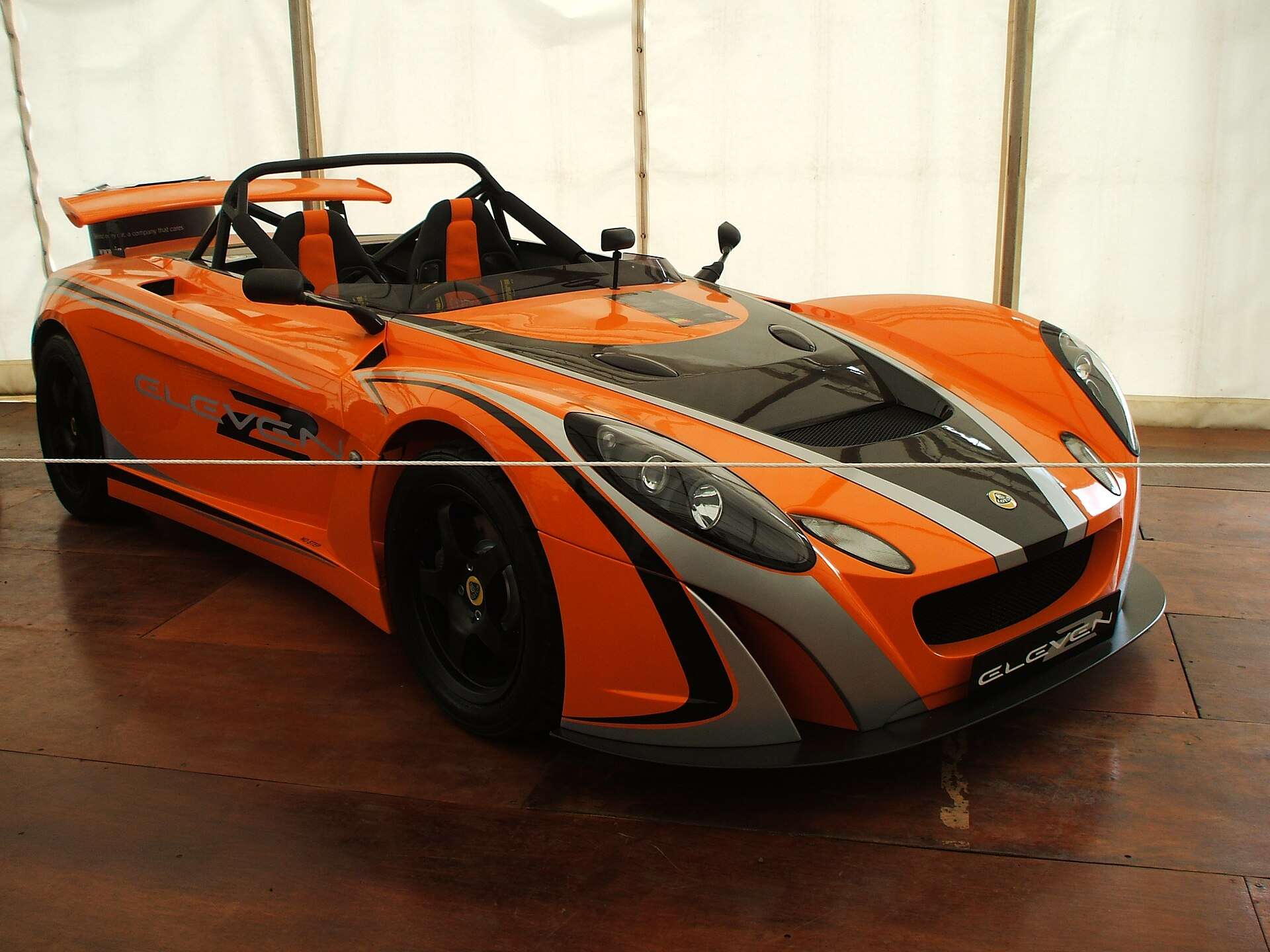 Orange Lotus 2-Eleven front three-quarter view
