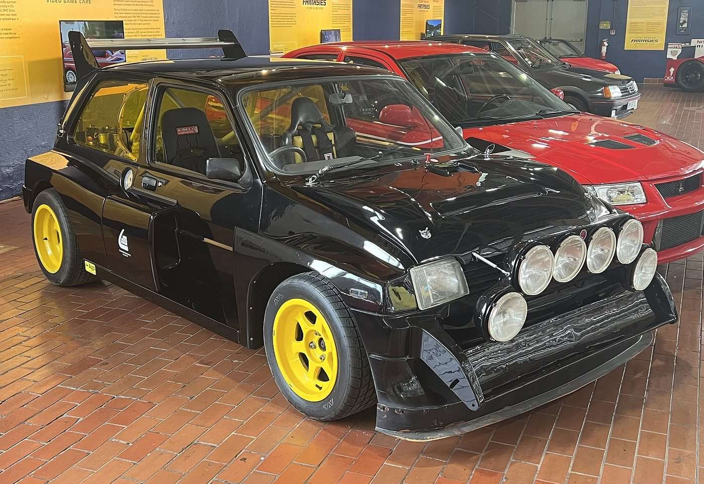 MG Metro 6R4 displayed in a motor museum