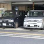 Nissan Cube Z11 and Z12 parked together front view