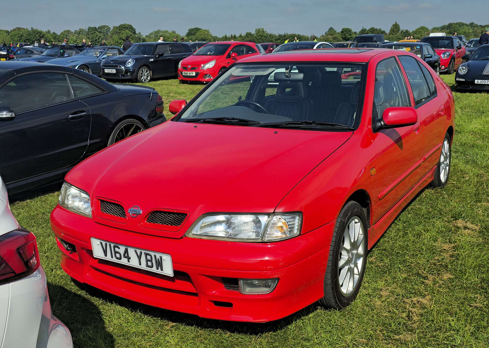 Silver Nissan Primera P11 GT front three-quarter view