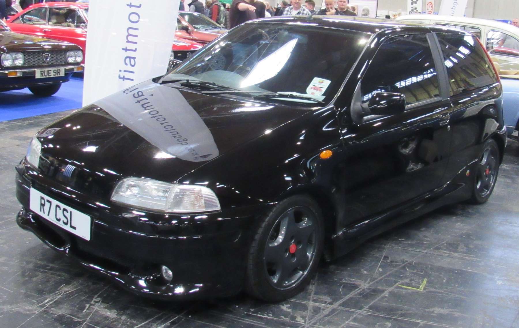 Black 1998 Fiat Punto GT viewed from the front three-quarter angle