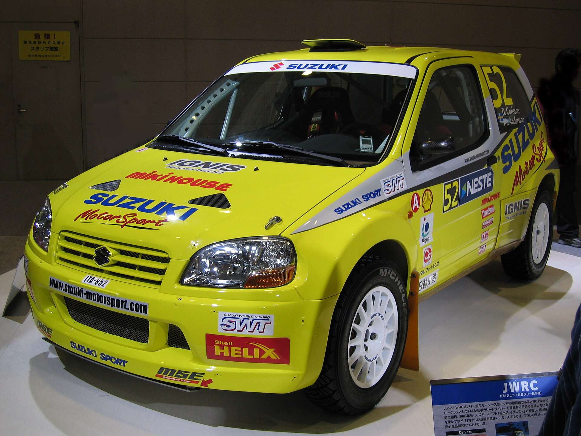 Suzuki Ignis Super 1600 rally car, the competition link behind the Sport image