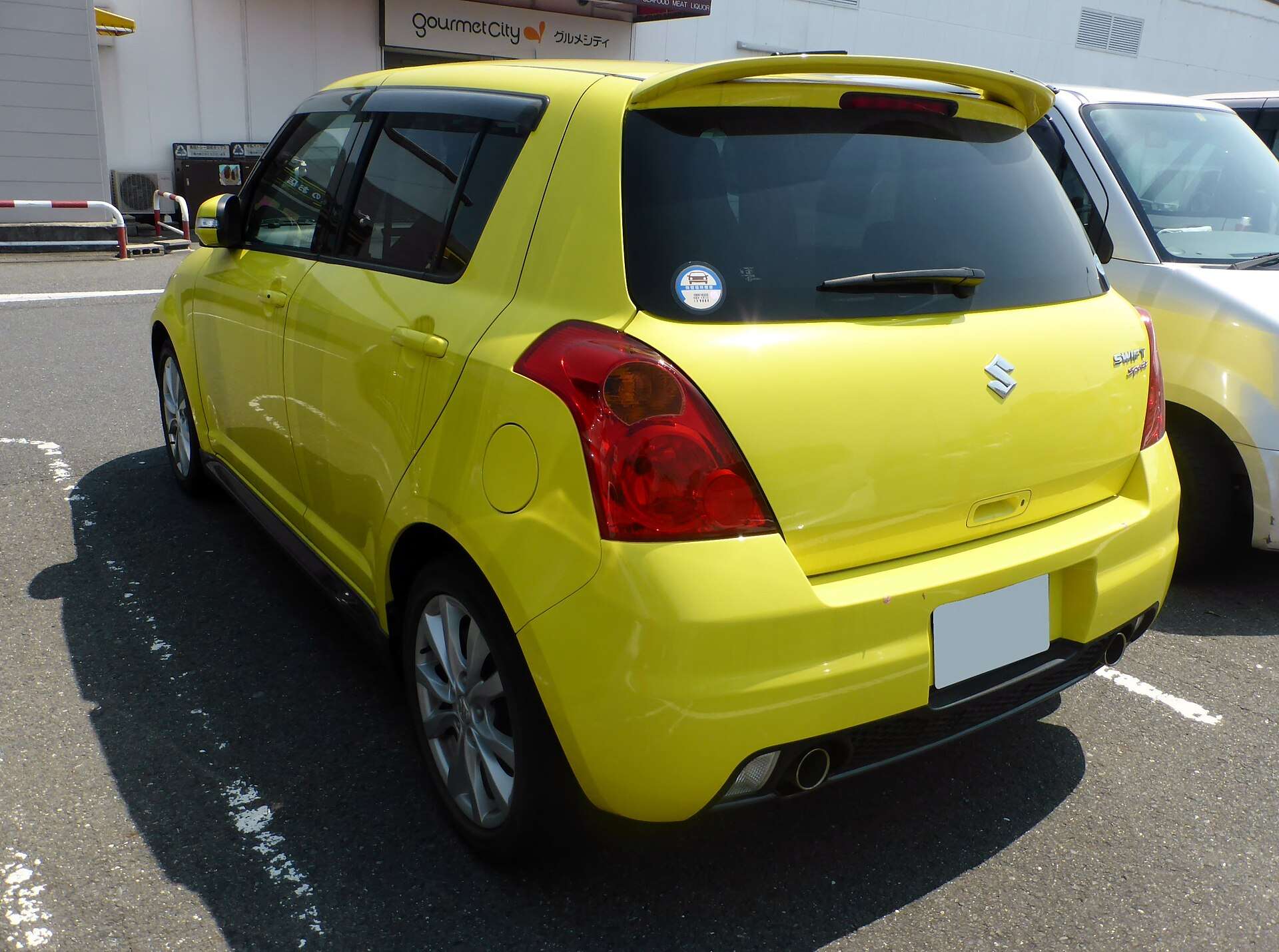 First-generation Suzuki Swift Sport ZC31S rear view