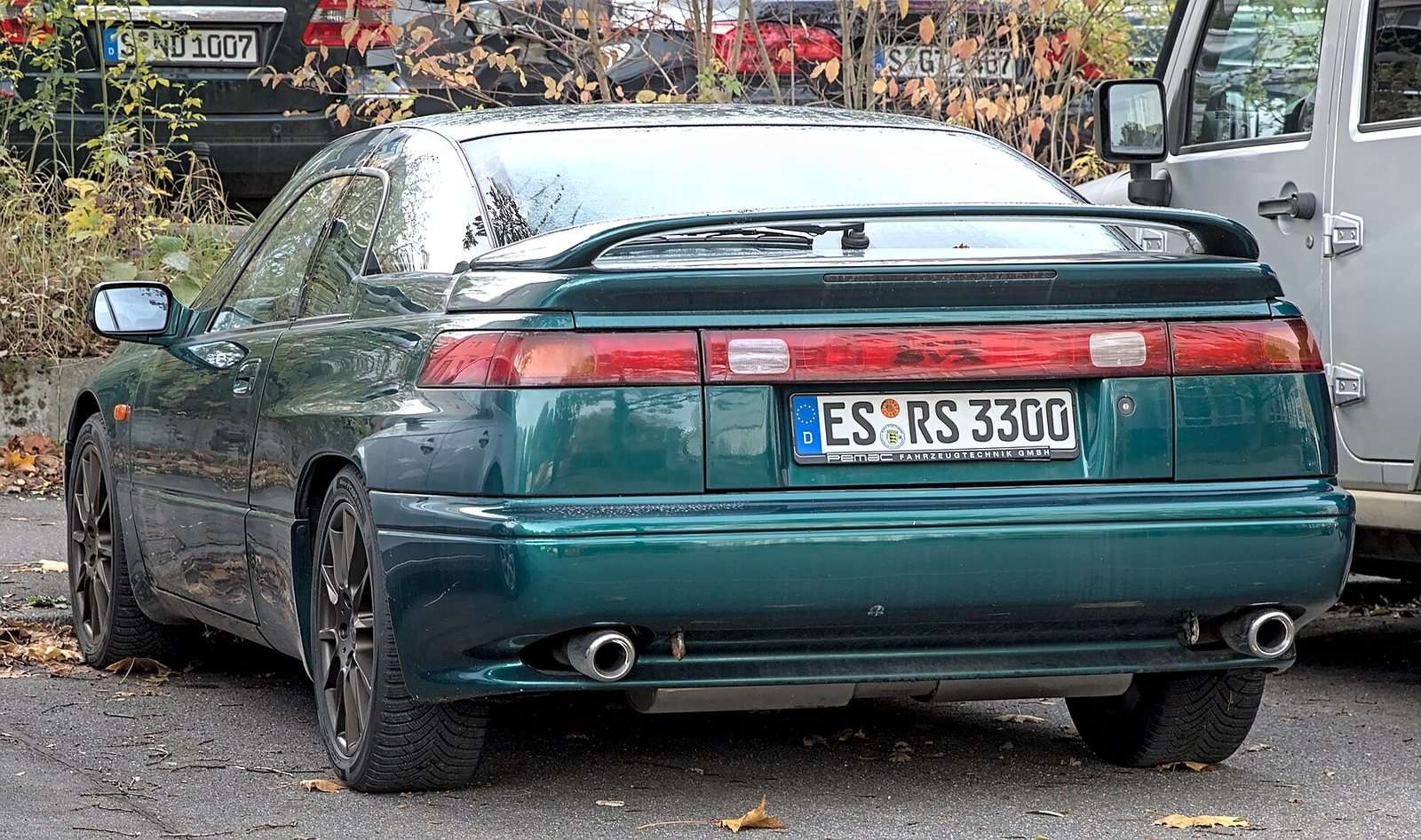 Subaru SVX showing its glass canopy and rear design