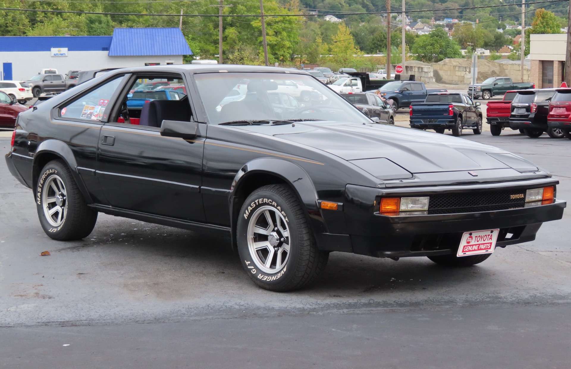 Black 1983 Toyota Celica Supra A60 front three-quarter view