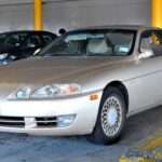 Dark red 1991 Toyota Soarer Z30 4.0 GT front three-quarter view
