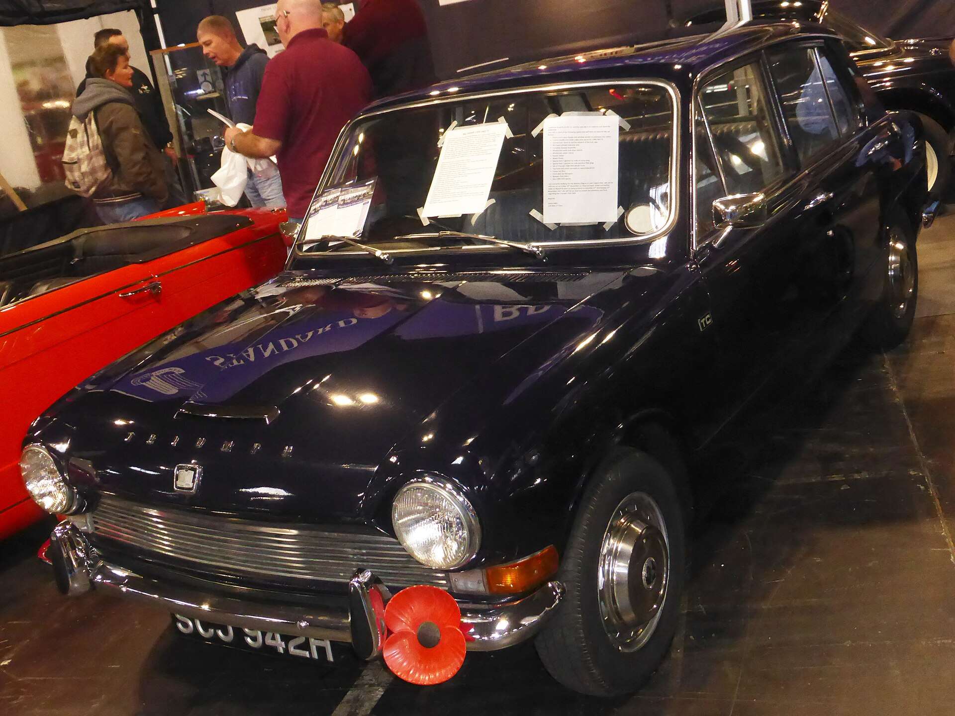 Red Triumph 1300TC front three-quarter view