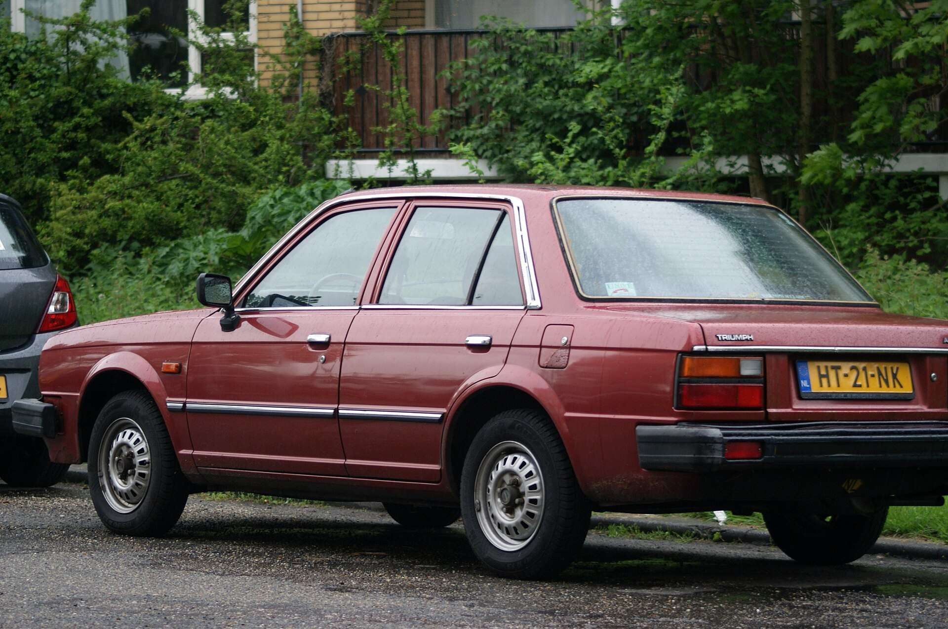 Burgundy 1982 Triumph Acclaim HLS automatic rear three-quarter view