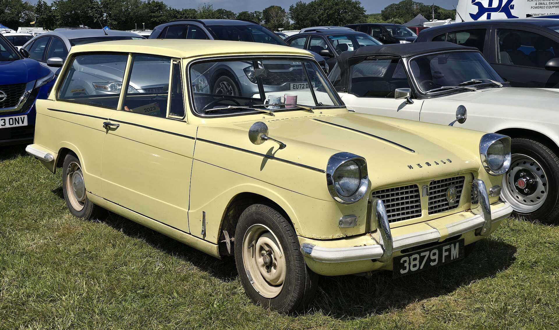 Cream Triumph Herald 1200 estate side view