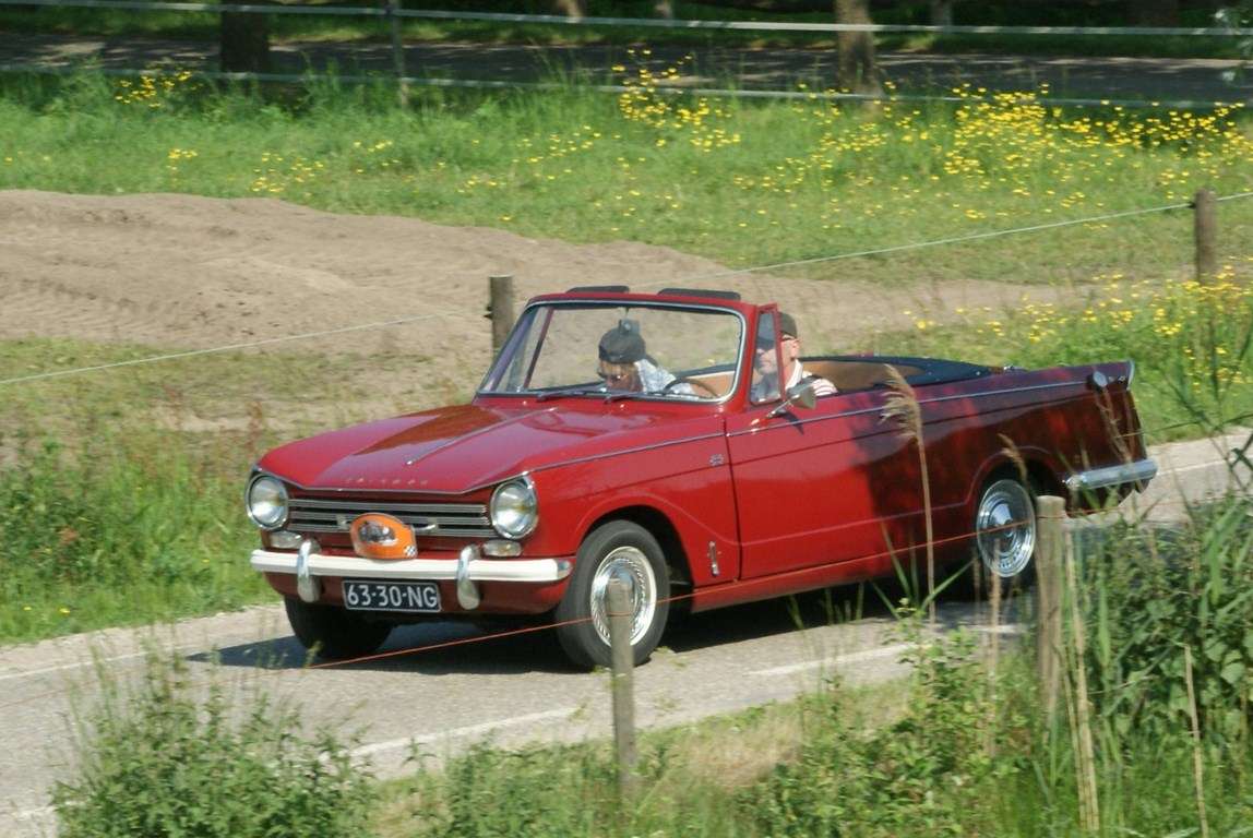 Red 1970 Triumph Herald 13/60 convertible