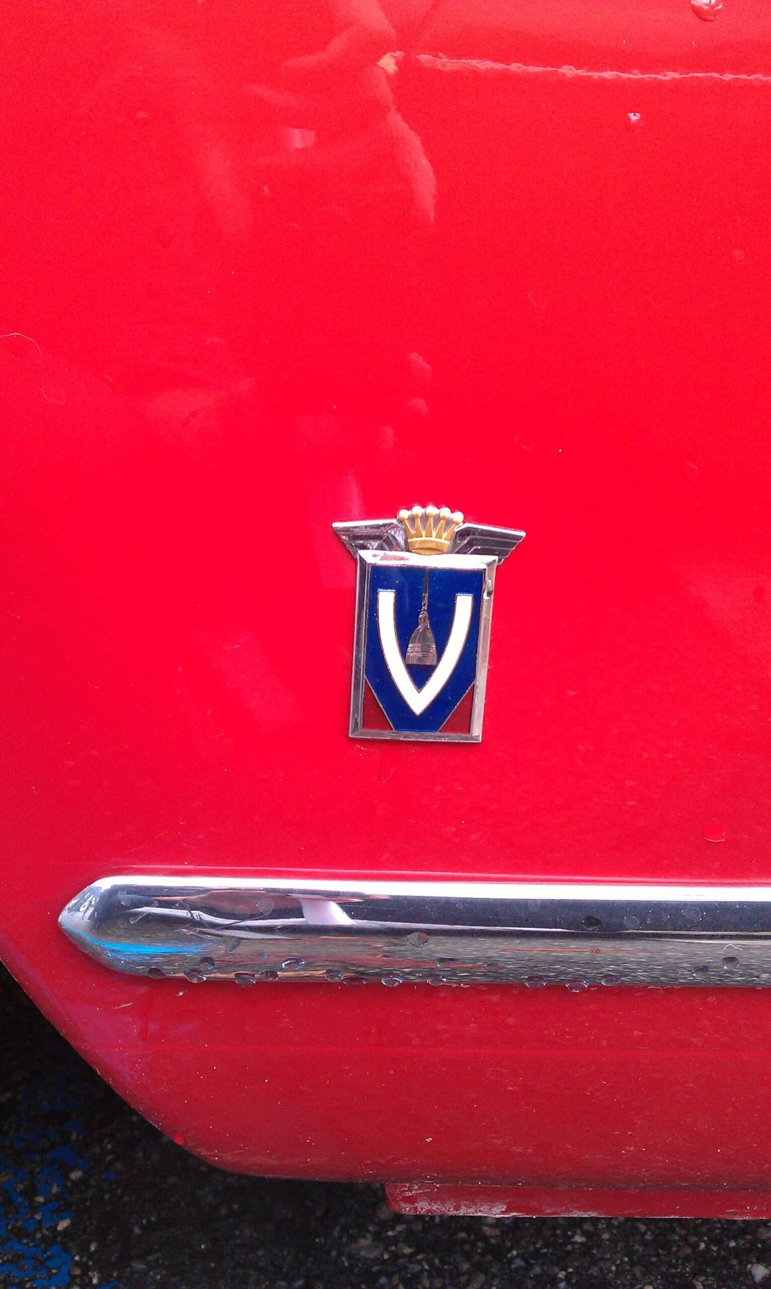 Vignale badge on the front wing of a Triumph Italia 2000