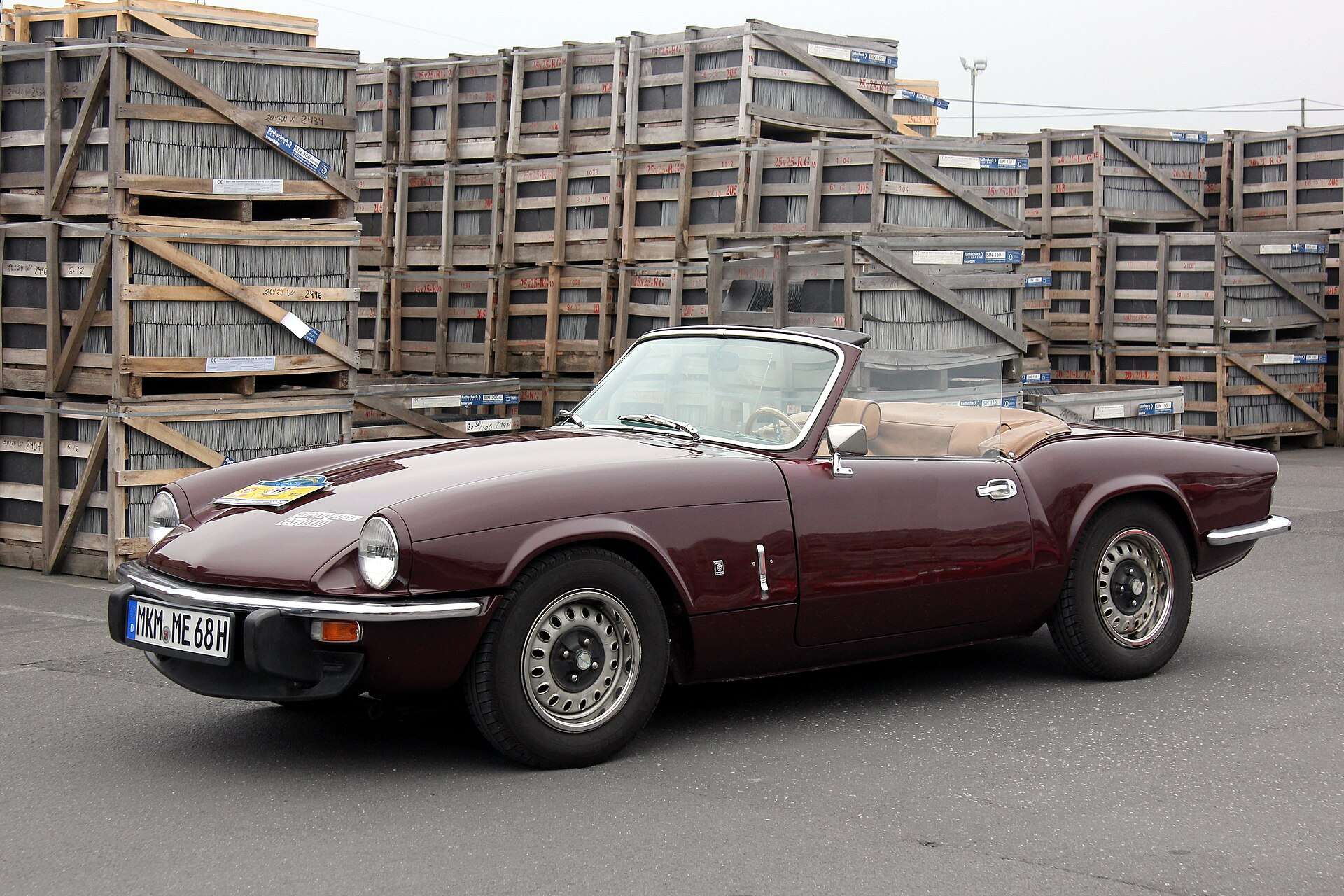 Burgundy Triumph Spitfire MkIV front three-quarter view