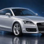 Silver Audi TT Mk2 (8J) Coupe in a blue diagnostic studio — illustrative artwork