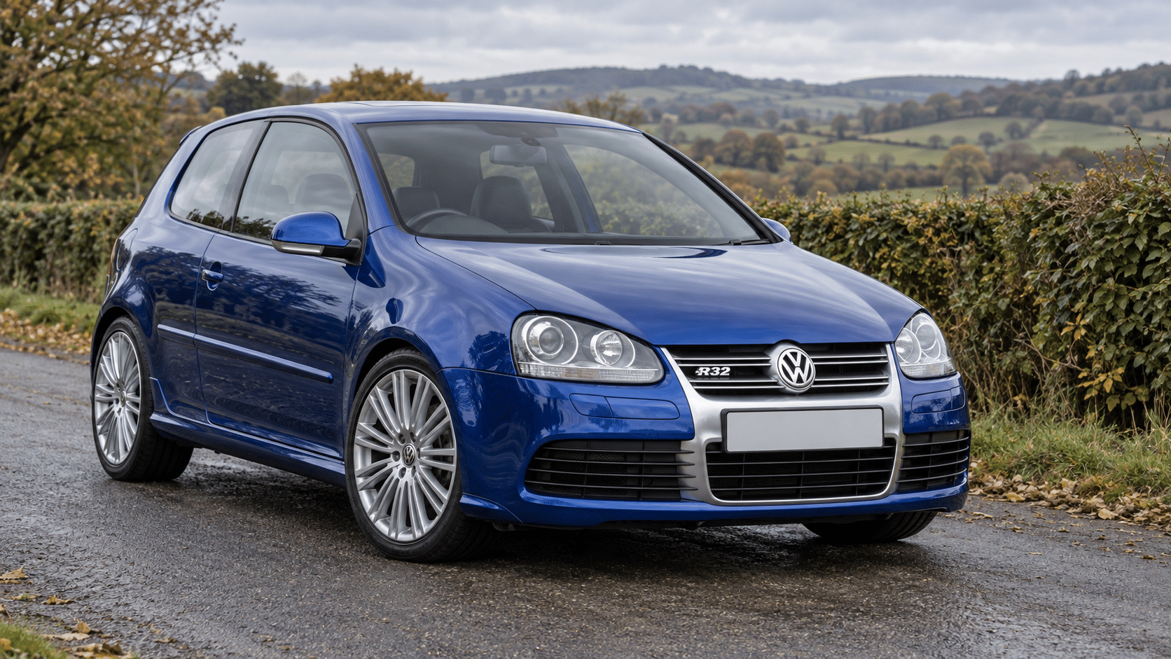 Blue Volkswagen Golf R32 Mk5 on a British country road — illustrative artwork