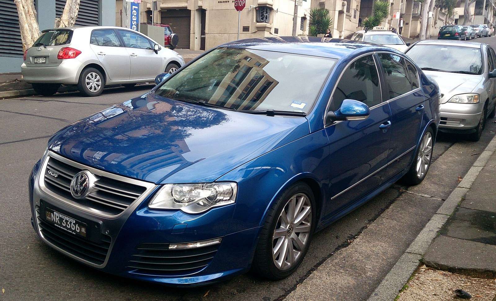 Blue Volkswagen Passat R36 saloon front